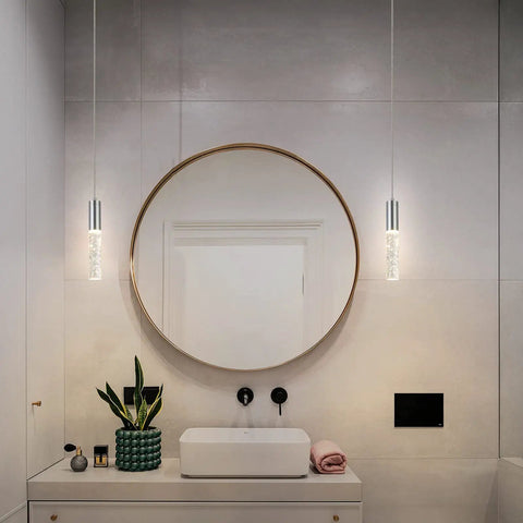 Pendant Lights For Kitchen Island 2 Pack Dope Modern Crystal Cylindrical Hanging Bar Lights illuminating a room with modern decor.