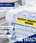 Heavy Duty All Weather Vinyl Labels Roll 1.5 Inches Wide X 25 Feet Black On White With Insanely Strong Adhesive For Piping Equipment Workbenches And Shop Floor Organization Compatible With Bmp51 M510 And M511 Printers on a storage box in snow.