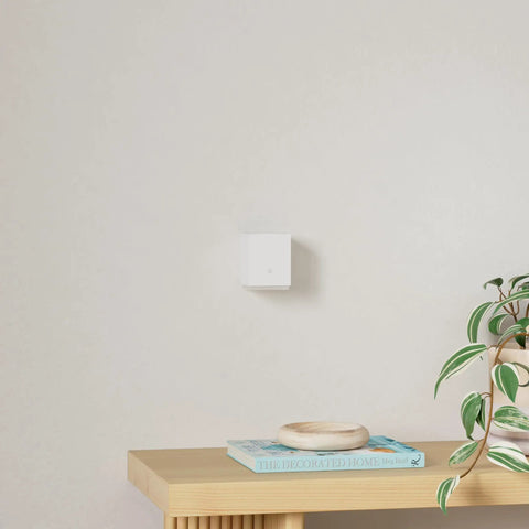 Modern Cube Wall Sconces With Adjustable Cable Distance And Smart RGBic LED Fixture That Hooks Up To Alexa, mounted on wall.