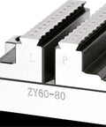 Close-up of a Self Centering Concentric Vise Featuring A Six Axis Rotary Turntable Fixture For Tight Machining Jobs delivering precise alignment.