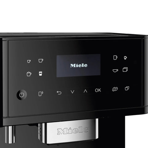 Sleek Fully Automatic Coffee And Espresso Machine With Silent Steel Grinding Chamber For Killer Cup Creations And Rich Silky Milk Foam For Serious Home Baristas control panel and display.
