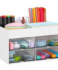 Desktop Organizer With Drawer And Multi Compartment Storage Box White filled with pens, sticky notes, and office supplies