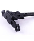 Close-up of Black Wrought Iron Door Strap Hinges, 6 Inch Long, Antique Colonial Spear Tip with visible holes and texture