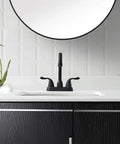 Matte Black Two Handle Bathroom Sink Faucet With Pop Up Drain And Supply Lines 4 Inch Centerset Design For 2 Or 3 Hole Lavatory Vanity Sleek Modern Fixture With No Fuss Install And Precise Temperature Control on white countertop