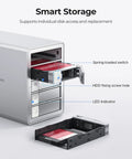 Massive 5 Bay Hard Drive Enclosure showing individual disk access mechanism with spring-loaded switch and LED indicator.