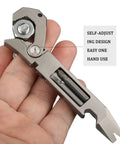 Hand holding EDC Titanium Multitool Pry Bar with Pocket Clip Mighty Bar Packs Wrench, Screwdriver, and features label