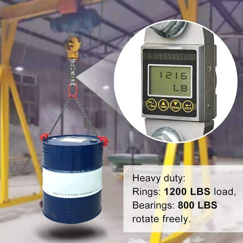 Heavy-duty hanging scale measuring 1216 lbs on suspended barrel in industrial setting