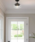 Summit 12 Inch Modern Industrial Farmhouse Semi Flush Mount Ceiling Light With Schoolhouse Glass Shade In Matte Black Finish Go To Bright Ceiling Fixture For Kitchen Hallway Or Living Spaces Rustic Yet Modern installed in a bright entryway scene