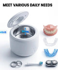 Ultrasonic Retainer Cleaner Machine With 44kHz Wave Action Deep Clean For Night Guards Mouth Guards Dentures Aligners And Jewelry 200ml Capacity White No Sweat One Button Start, open lid, 304SUS steel, showing dentures, aligners, rings, brush head.
