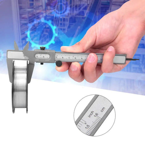 Hand using High Precision Vernier Caliper with Dual Metric and Inch Readings, 5 Inch Metal Caliper, close-up on scale and readings.