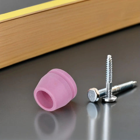 Heavy Duty Plasma Cutter Torch Tip Nozzle Consumables Kit For Handheld Welding includes pink nozzle and metal screws on surface.