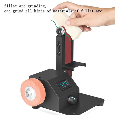 Close-up of a hand using the Multifunctional Electric Belt Sander Grinder With 10 Belts for fillet arc grinding on a workbench.