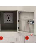 Interior view of Heavy Duty Steel Cell Phone Locker With Integrated Charging Station showing an electrical outlet and secure compartment.
