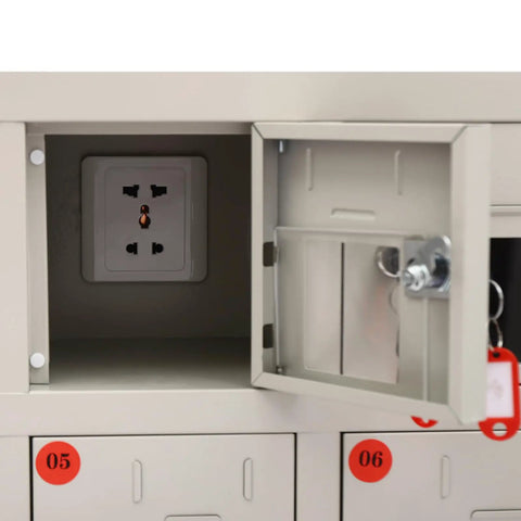 Interior view of Heavy Duty Steel Cell Phone Locker With Integrated Charging Station showing an electrical outlet and secure compartment.