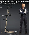 Height adjustable Beefy Pro Grade Aluminum Bike Repair Stand with 360-degree clamp, standing next to a person for scale, max 63 inches tall.