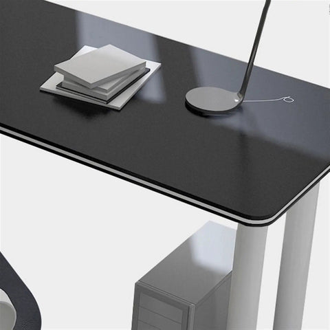 Built Different L Shaped Corner Computer Desk For Compact Rooms And Modern Home Offices Featuring Anti Bump Edging 180X120CM sleek matte black top with papers and lamp