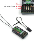 Close-up of Six Channel 2.4GHz AFHDS 2A RC Receiver with wire connectors and labeled voltage for fixed wing glider quadcopter use