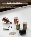 Stainless steel fittings with bronze, black, and gold finishes with screws and non-slip pads on a table.