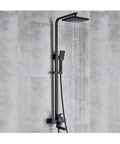 UMJIGF Matte Black Shower System with Cold and Hot Water Shower Faucet Set Multifunction Single Handle Shower Combo Set with Shower Head, 3 Spray Handheld Shower, Rotating Tub S mounted on a wall with water running from the shower head.