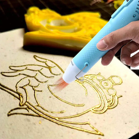 Compact Mini Heat Gun Goes Hard On Sweet Diy Craft Jobs showing the tool in use on a design, blue ergonomic grip with precise heat.
