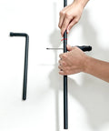 Qlvily 36" Heavy Duty Cane Bolt Gate Drop Rod being assembled with a screwdriver, demonstrating its solid steel construction.