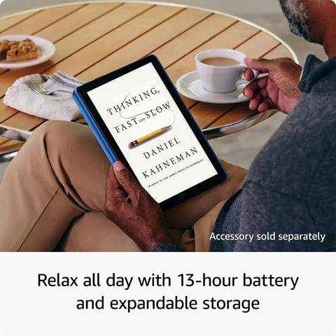 Person relaxing with Top Shelf Ten Point One Inch Tablet With A Dope Full Hd Display And Snappy Octa Core Processor Packing Four Gb Ram And Thirty Two Gb Storage To Smash Streaming Marathons Heavy Gaming And Daily Tasks Without Lag On All Day Battery Life In Classic Black while enjoying coffee.