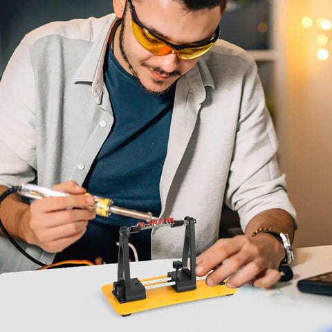 Bright Yellow Multi Purpose Item For Home And Office Use shown in use by man soldering, lightweight design