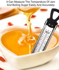 Stainless Steel Candy And Deep Fry Thermometer With Pot Clip And Handle, Analog Sugar Thermometer measuring syrup in bowl