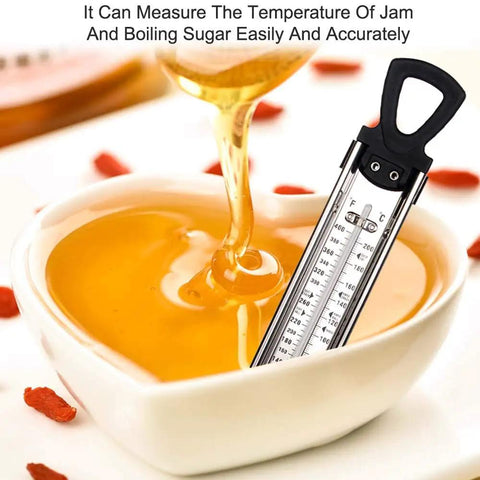 Stainless Steel Candy And Deep Fry Thermometer With Pot Clip And Handle, Analog Sugar Thermometer measuring syrup in bowl