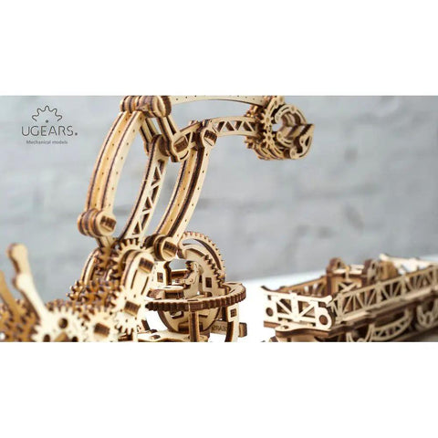 Wooden Self Propelled 3D Puzzle Rail Mounted Manipulator Construction Set For Curious Builders And Hobbyists Totally Great For STEM Learning Hands On Tinkering And Creative Engineering Projects.