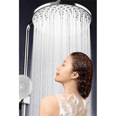 Top Shelf Bathroom Handheld Shower Set With Surface Mounted Faucet And Rust Proof 304 Stainless Steel Body Featuring Solid Copper Core Three High Power Spray Options And Quick Wipe Silicone Nozzles For Zero Hassle Plug And Play Install in use with overhead water flow.