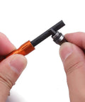 Close-up of replacing threaded ferro rod in 2 Pack Compact Fire Starters With Scraper Striker, Magnesium Fire Steel kit