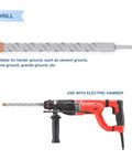 SDS-Plus rotary hammer drill bit, 1-3/8 in, with orange tip; red corded hammer drill pictured beside it