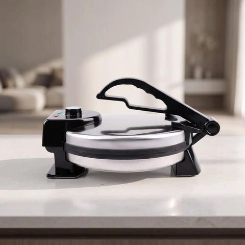 Baoblaze Electric Pancake Maker Nonstick Hinged Flatbread Press on kitchen counter with black handle and stainless plate.