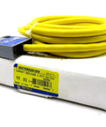 Yellow Limit Switch Series B Model 9007MS02S0300 for industrial automation on white box with cable