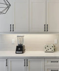 Kitchen scene with Rustic Black Cabinet Pulls 10 Pack Antique Hammered Kitchen Hardware Vintage Drawer Handles on white cabinets