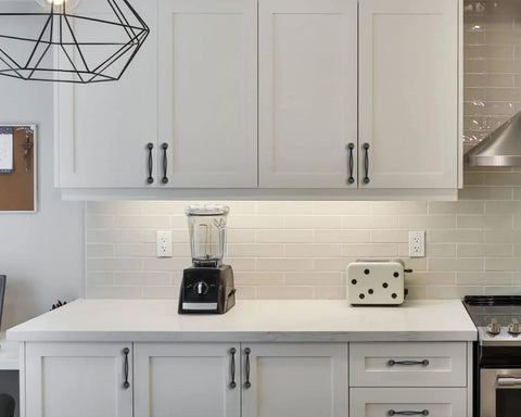 Kitchen scene with Rustic Black Cabinet Pulls 10 Pack Antique Hammered Kitchen Hardware Vintage Drawer Handles on white cabinets