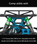 Close-up of aluminum front and rear shock absorbers for 1 to 10 Slash 4x4 2WD Rustler VXL Stampede RC car, green anodized.
