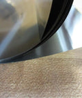 Full Hard Cold Rolled Steel Shim Stock Rolls 0.002 Inch Thick 6x10 Inch Shims 16a2 Low Carbon Steel For Precise Calibrations And DIY Projects, Multiple Thickness Options close-up view of rolled steel edges