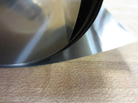 Full Hard Cold Rolled Steel Shim Stock Rolls 0.002 Inch Thick 6x10 Inch Shims 16a2 Low Carbon Steel For Precise Calibrations And DIY Projects, Multiple Thickness Options close-up view of rolled steel edges