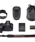 R6 Mark II Full Frame Mirrorless Camera Kit With RF 24-105mm F4 L IS USM Lens, charger, battery, lens pouch, and strap
