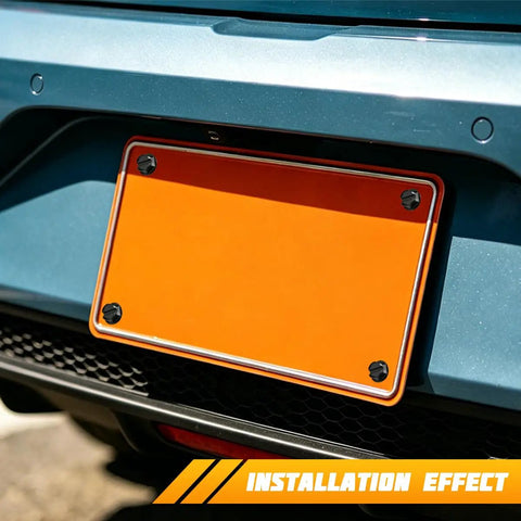 Installation view of Hella Tough Slotted Stainless Steel License Plate Screws in black on a vehicle's rear license plate.