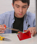Person soldering electronics with 2 Pack Soldering Station Clamp Helping Hands With Magnetic Base And 5 Wire Slots For 30AWG To 12AWG Wires