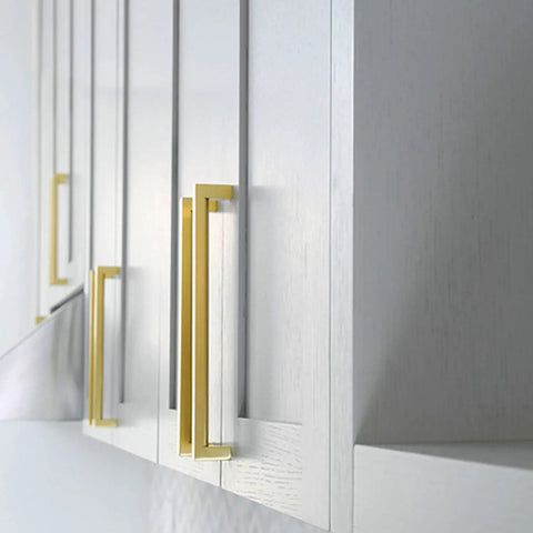 Close-up of kitchen cabinets with 35 Pack 5 Inch Brushed Brass Cabinet Handles Set For Kitchen Cabinets And Furniture Stainless Steel Modern Pulls