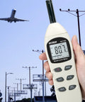 Person holding Must Have Pro Grade Digital Sound Level Meter For Worksites And Audio Installations 40 To 130 dB Range.