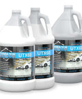 Straight Up Tough Matte Concrete Floor Coating For Garages Stops Oil Gas Grease And Tires Blocks Surface Dust Delivers Self Priming Heavy Duty Protection Three Gallon Complete Kit in three glossy bottles.