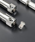 Close-up of 70 Piece M5 Stainless Steel Flat Head Rivet Nuts Kit With Threaded Inserts for easy furniture repairs on black surface.