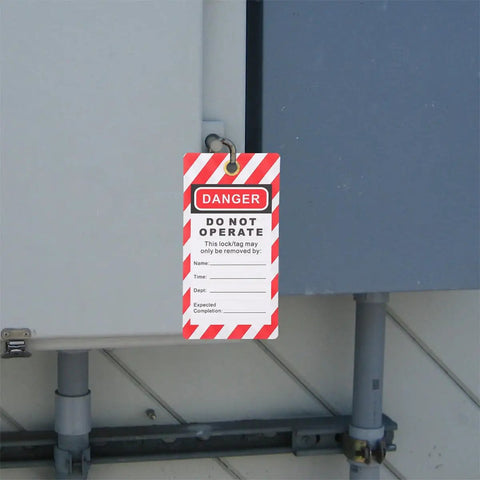 6 Pack Industrial Lockout Tags And Safety Labels For Equipment Repair Built To Take A Beating attached to factory panel