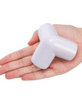 Hand holding 24 Pack Three Way Three Quarter Inch PVC Pipe Fittings Elbow Side Outlet 90 Degree Connectors, white