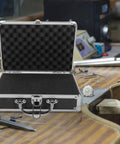 Rugged Aluminum Tool Case With Sturdy Handle, Large Capacity All-In-One Storage Box For Tools in a workshop setting